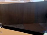 an image of a television in a box on a table