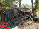 a lot of hoses that are sitting on the ground