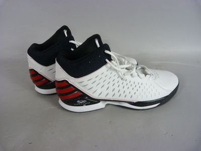 a close up of a pair of shoes on a white surface
