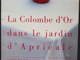 a poster with a red bowl sitting on a table
