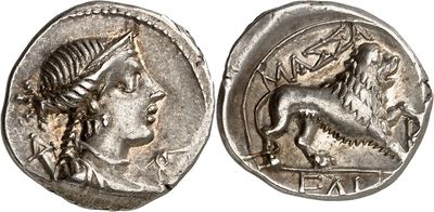 a silver coin with an image of a woman and a lion on it