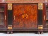 a large wooden cabinet with a clock on top of it