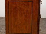 an image of a small wooden cabinet with a drawer on top of it