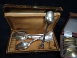 silver spoons and spoon spoons in a box