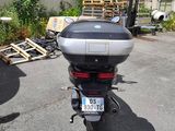 a motorcycle that is parked in a parking lot