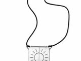 a close up of a necklace with a sun on it on a white background