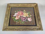 tableau représentant un bouquet de roses dans un cadre doré sur fond blanc