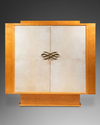 an art deco cabinet with two doors and two drawers