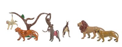 a lot of figurines of different animals on a white background
