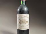 a bottle of wine that is sitting on a table
