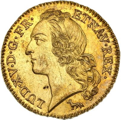 une pièce d'or portant un visage de femme