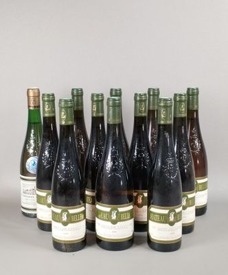 six bottles of wine are lined up in a row on a table