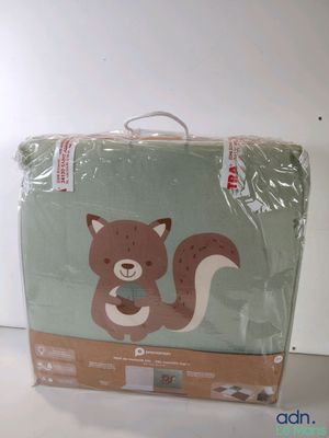 une boîte sur laquelle est représenté un petit écureuil
