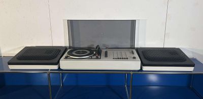 a picture of a record player sitting on top of a table