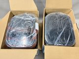 two boxes that have a couple of items inside of them