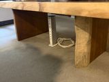 a large wooden table in the middle of a room