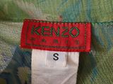 the label of a kenzo dress is on the back of the dress