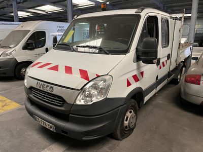 a white van that is parked in a parking lot
