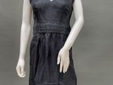 an image of a mannequin dressed in a black dress