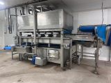 une image d'une machine qui se trouve dans un bâtiment