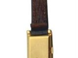 a brown leather belt with a gold buckle on a white background