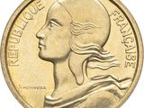 an image of a close up of a coin with a woman ' s face