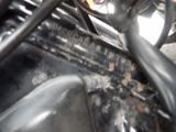 a close up view of a motorcycle with the front lights on