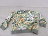 the sweater is green and has a tiger and tiger print on it