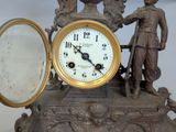 a clock that is sitting on top of a table