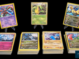 six different types of pokemon cards displayed on a black background