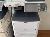 three multi - function printers are stacked on top of each other