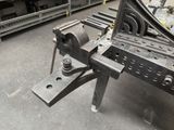 an image of a piece of metal being worked on