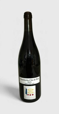 a bottle of wine that is sitting on a table