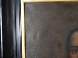 painting of a man with a beard and a mustache in a black frame