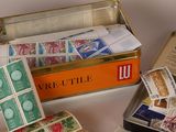 a box of stamps and a box of stamps on a table