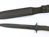 two knives are laying side by side on a white surface