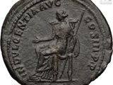 an ancient coin with a woman on a horse and a man on a horse
