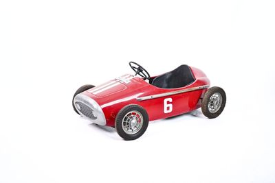 a red toy car with a number six on it
