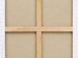 a close up of a picture frame with a cross on it