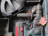 a tool box with tools inside of it on the floor