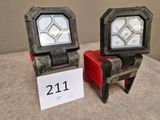 two lights that are sitting next to each other
