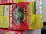 three boxes of demon fruit sitting on top of a table