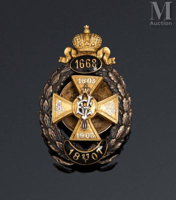 a close up of a badge on a black surface
