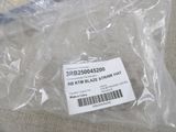 a plastic bag with a label on it sitting on a couch