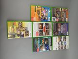 a lot of video games hanging on the wall