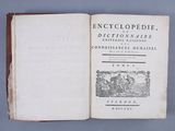 an open book with a picture of a man riding a horse on the cover