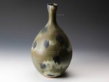 a small vase that is sitting on a table