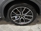 a close up of a tire on a car ' s rim
