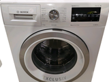 an image of a washer and dryer sitting next to each other