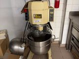 an image of a kitchen with a mixer and a fire extinguisher